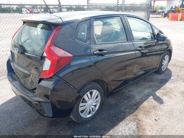 JHMGK5H51GS008594 Honda FIT LX