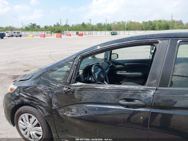 JHMGK5H51GS008594 Honda FIT LX