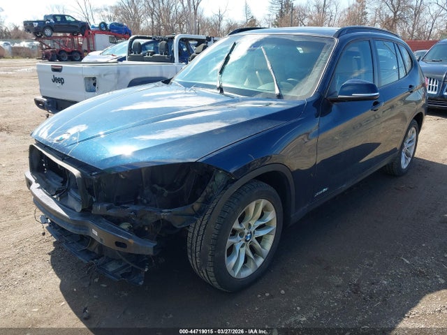 2015 BMW X1 WBAVL1C50FVY28908 Photo 1