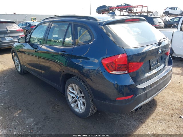 2015 BMW X1 WBAVL1C50FVY28908 Photo 2