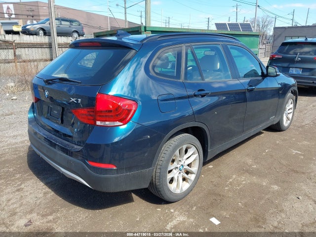 2015 BMW X1 WBAVL1C50FVY28908 Photo 3