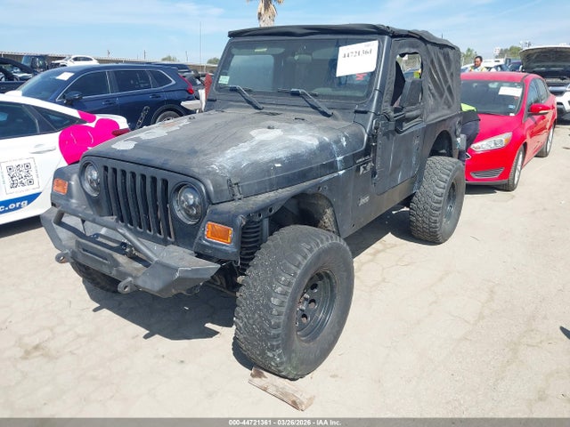 2002 JEEP WRANGLER 1J4FA39S82P773395 Photo 1