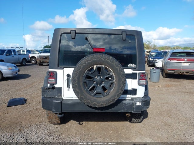 1C4BJWDG9GL133168 Jeep Wrangler Unlimited Sport