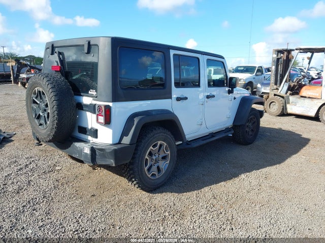 1C4BJWDG9GL133168 Jeep Wrangler Unlimited Sport