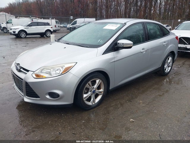 2013 FORD FOCUS 1FADP3F24DL348692 Photo 1