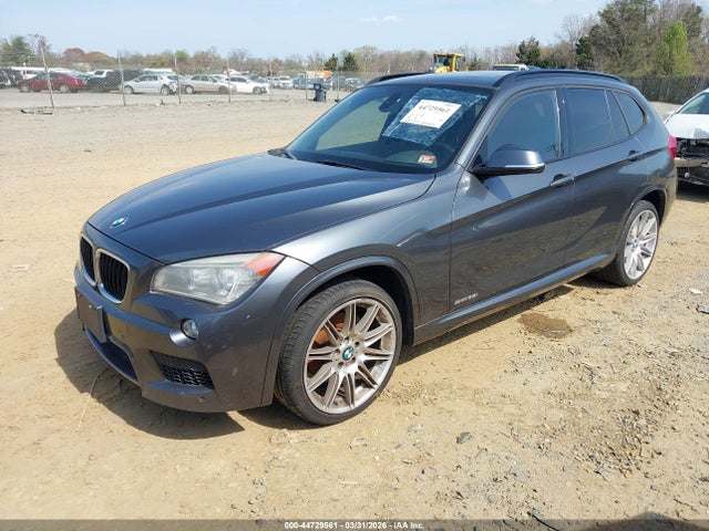 2015 BMW X1 WBAVM1C54FVZ93860 Photo 1