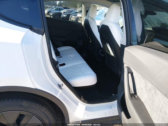 2025 TESLA MODEL Y 7SAYGDED4SF280126 Photo 7