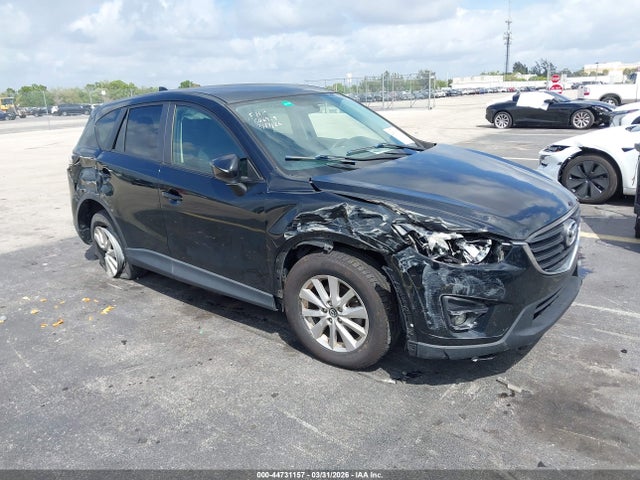 2016 Mazda Cx-5 Touring მანქანა იყიდება აუქციონზე, vin: JM3KE4CY3G0606929, აუქციონის ნომერი: 44731157