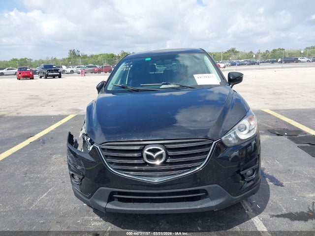 2016 Mazda Cx-5 Touring მანქანა იყიდება აუქციონზე, vin: JM3KE4CY3G0606929, აუქციონის ნომერი: 44731157