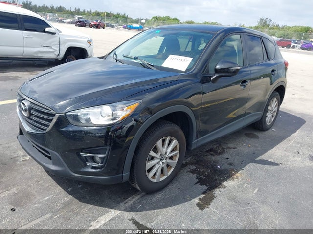 2016 Mazda Cx-5 Touring მანქანა იყიდება აუქციონზე, vin: JM3KE4CY3G0606929, აუქციონის ნომერი: 44731157