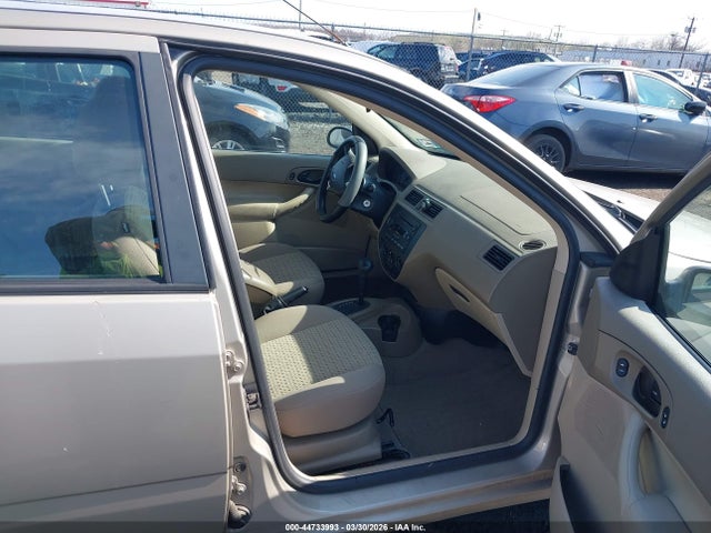 2007 FORD FOCUS 1FAHP34N47W166668 Photo 4
