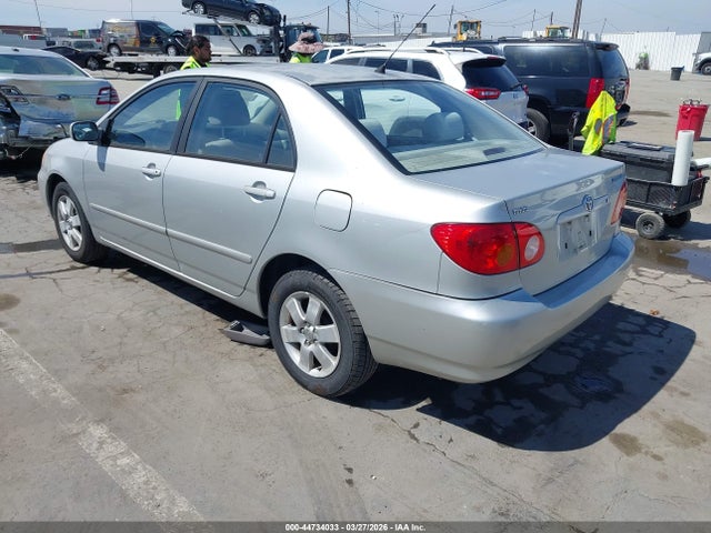 2004 TOYOTA COROLLA 1NXBR32E34Z262310 Photo 2