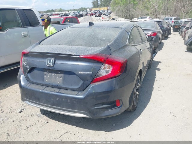 44735958 :رقم المزاد ، 19XFC1F96ME005214 vin ، 2021 Honda Civic Touring مزاد بيع