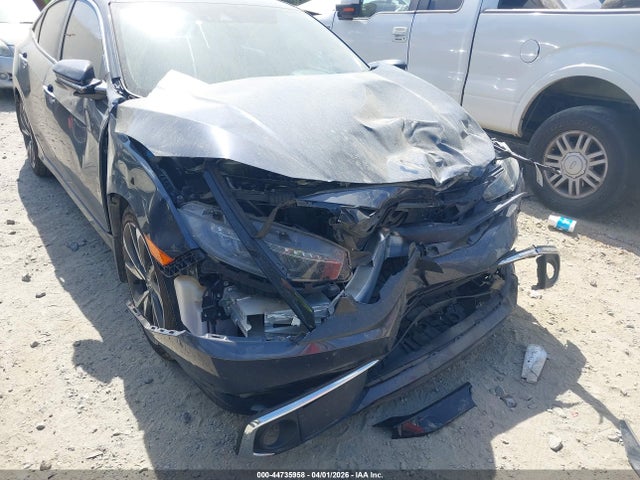 44735958 :رقم المزاد ، 19XFC1F96ME005214 vin ، 2021 Honda Civic Touring مزاد بيع