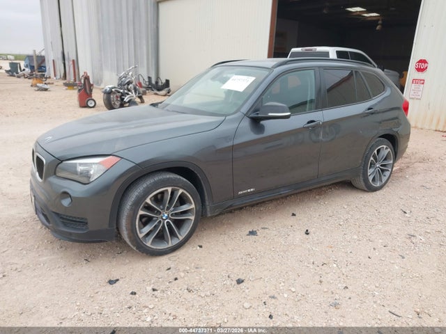 2015 BMW X1 WBAVM1C56FV314977 Photo 1