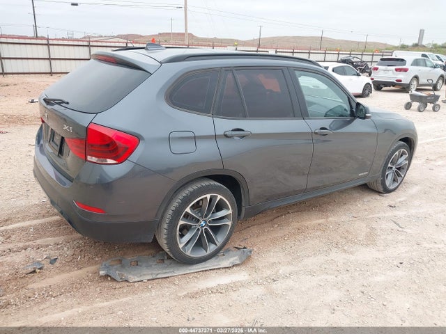 2015 BMW X1 WBAVM1C56FV314977 Photo 3