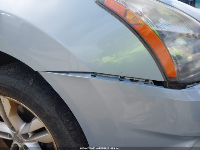 JN8AS5MV5FW261409 Nissan Rogue Select S