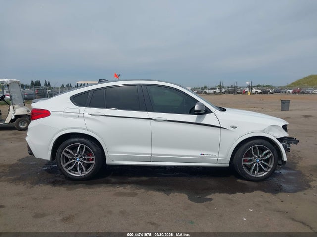 5UXXW7C58J0W65032 BMW X4 M40i
