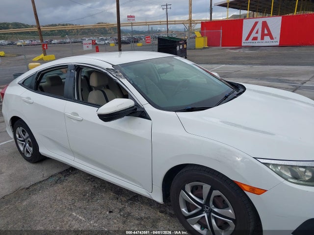 2HGFC2F58GH557391 Honda Civic Lx