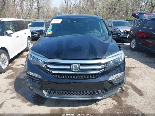 Продажа на аукционе авто 2017 Honda Pilot Touring, vin: 5FNYF6H97HB073841, номер лота: 44746823
