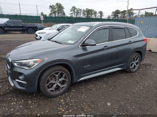 2016 BMW X1 WBXHT3C38G5E48670 Photo 1