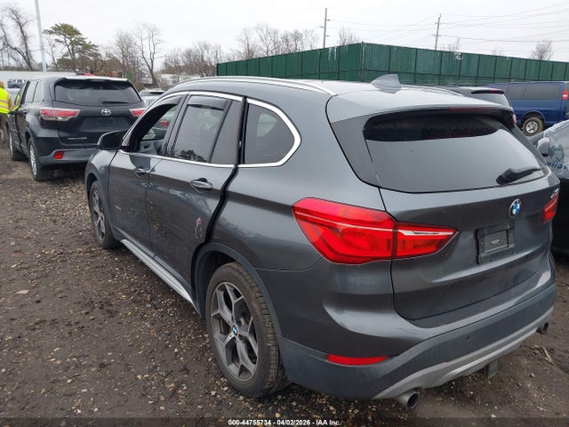 2016 BMW X1 WBXHT3C38G5E48670 Photo 2