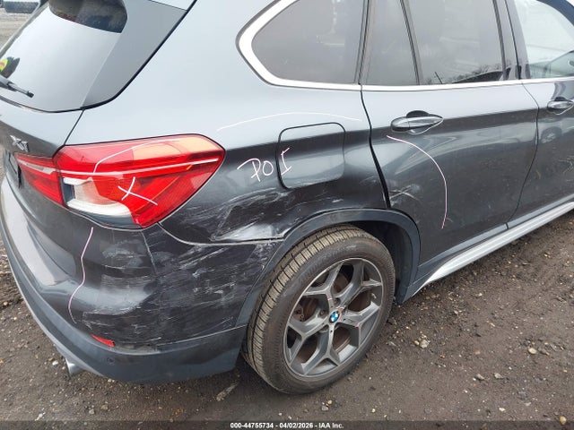 2016 BMW X1 WBXHT3C38G5E48670 Photo 5