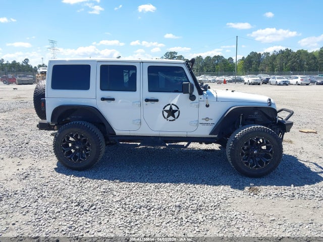 1C4HJWDG3FL605907 Jeep Wrangler Unlimited Freedom Edition