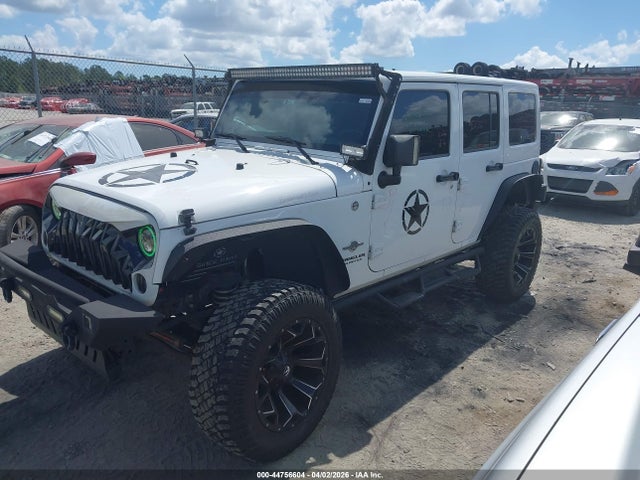 1C4HJWDG3FL605907 Jeep Wrangler Unlimited Freedom Edition