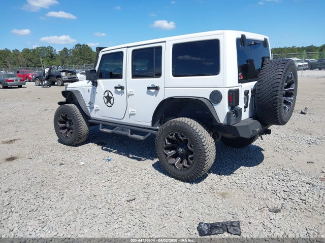 1C4HJWDG3FL605907 Jeep Wrangler Unlimited Freedom Edition