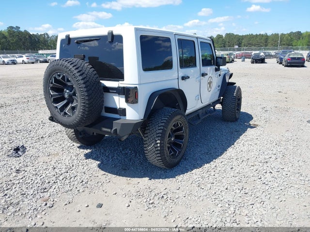 1C4HJWDG3FL605907 Jeep Wrangler Unlimited Freedom Edition