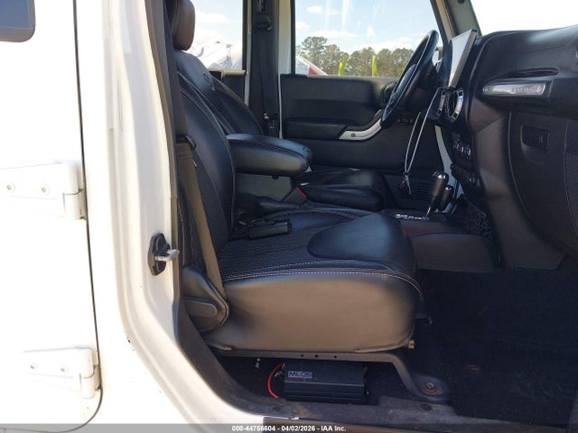 1C4HJWDG3FL605907 Jeep Wrangler Unlimited Freedom Edition