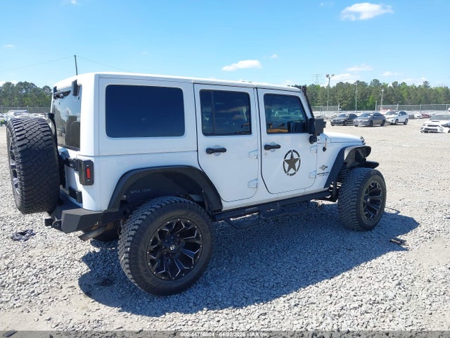 1C4HJWDG3FL605907 Jeep Wrangler Unlimited Freedom Edition
