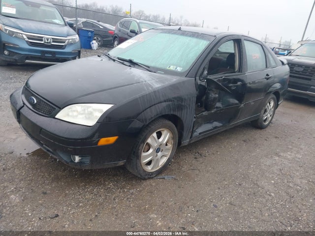 2005 FORD FOCUS 1FAFP38Z65W203690 Photo 1