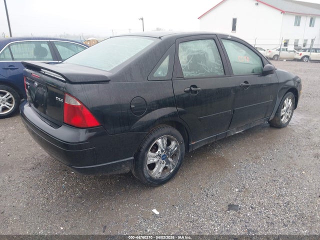 2005 FORD FOCUS 1FAFP38Z65W203690 Photo 3