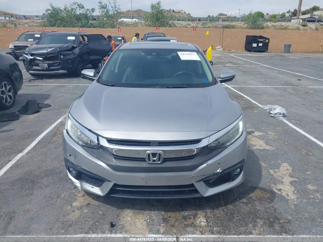 2HGFC1F9XGH635134 Honda Civic Touring