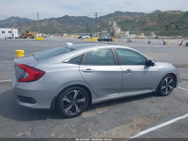 2HGFC1F9XGH635134 Honda Civic Touring