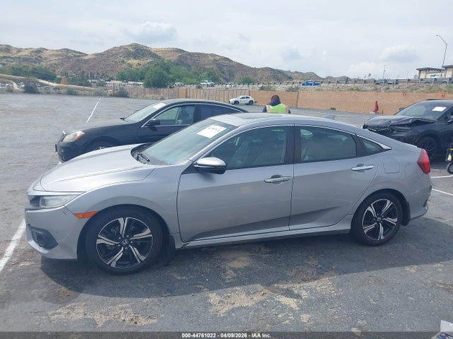 2HGFC1F9XGH635134 Honda Civic Touring