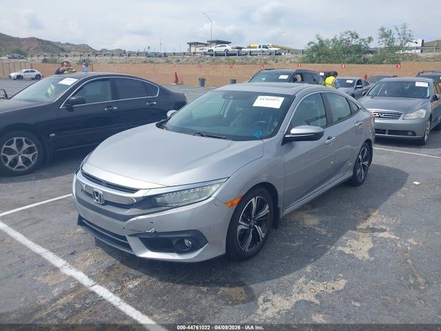 2HGFC1F9XGH635134 Honda Civic Touring