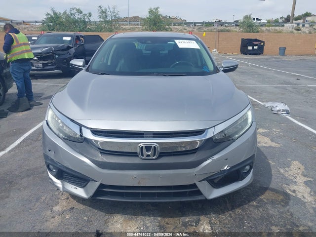 2HGFC1F9XGH635134 Honda Civic Touring