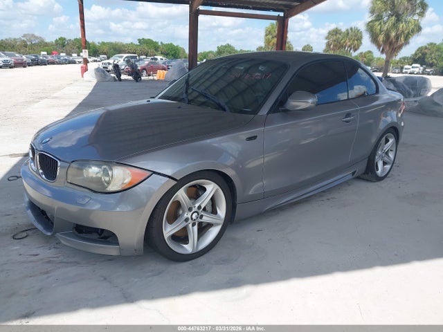 2011 BMW 135I WBAUC9C52BVM10824 Photo 1