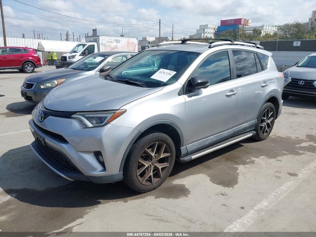 2T3NFREV1GW300584 Toyota RAV4 SE
