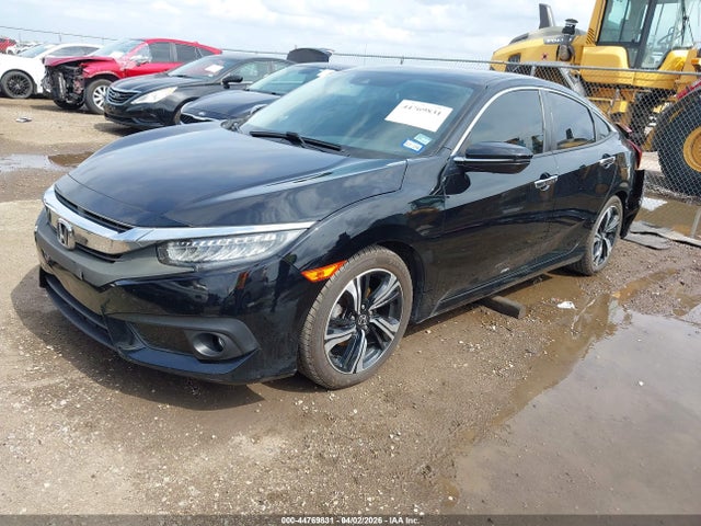 2016 Honda Civic Touring მანქანა იყიდება აუქციონზე, vin: 19XFC1F91GE009028, აუქციონის ნომერი: 44769831