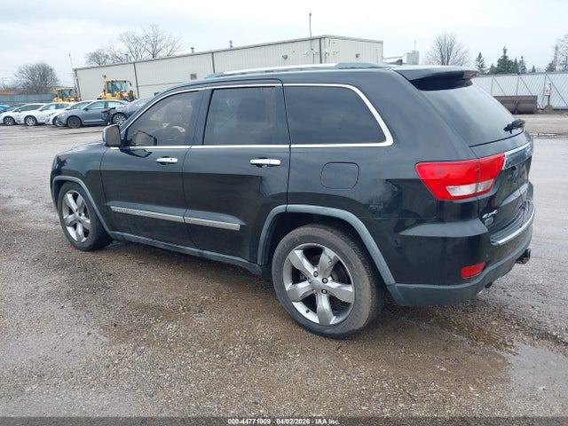 2011 JEEP GRAND CHEROKEE 1J4RR6GT7BC686775 Photo 2