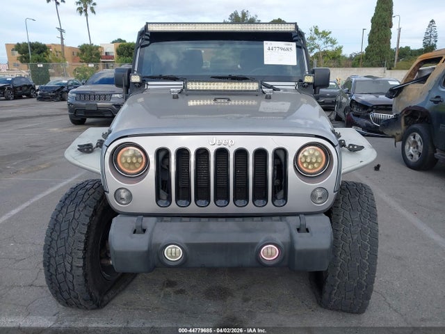 44779685 :رقم المزاد ، 1C4BJWDG8FL643350 vin ، 2015 Jeep Wrangler Unlimited Sport مزاد بيع