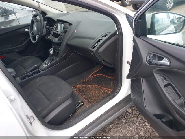 2015 FORD FOCUS 1FADP3F21FL204567 Photo 4