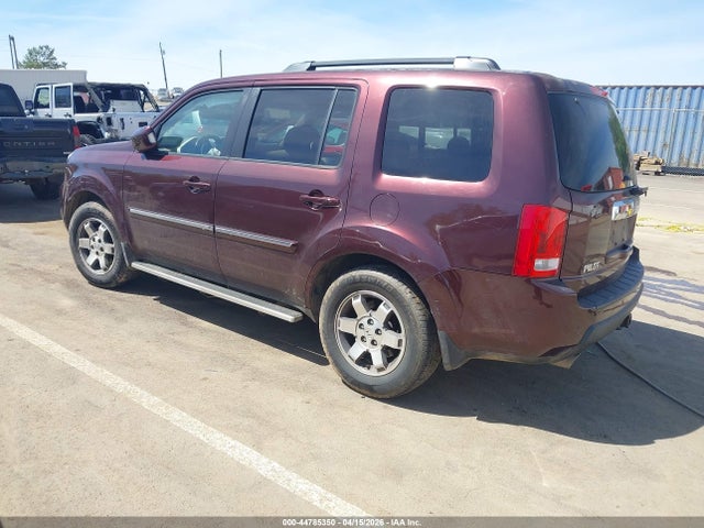 2010 Honda Pilot Touring მანქანა იყიდება აუქციონზე, vin: 5FNYF4H95AB016127, აუქციონის ნომერი: 44785350