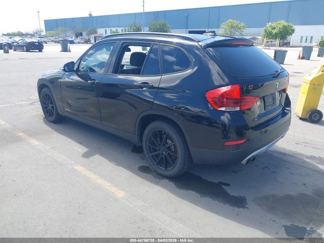 2014 BMW X1 WBAVM1C52EVW55016 Photo 2
