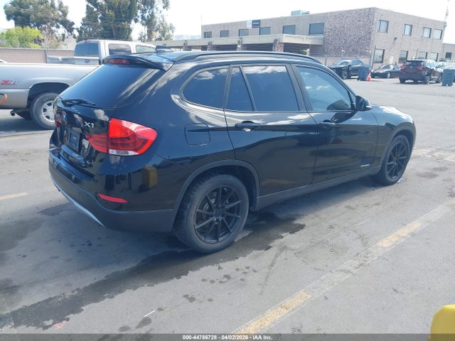 2014 BMW X1 WBAVM1C52EVW55016 Photo 3