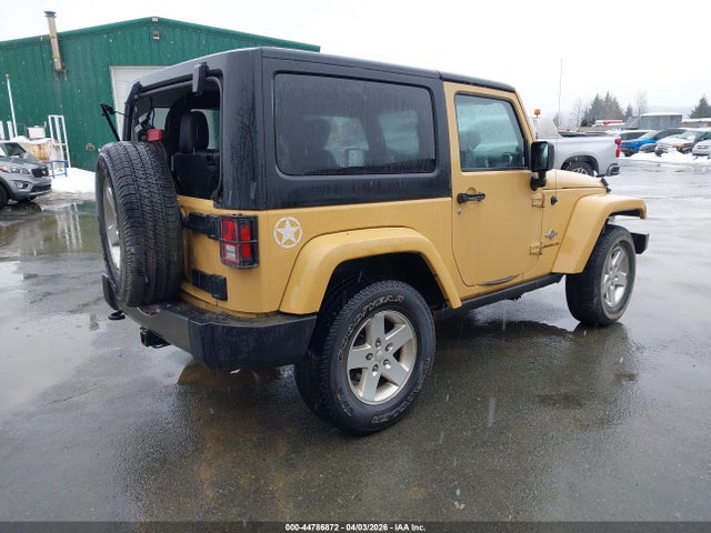 1C4AJWAG5EL209935 Jeep Wrangler Freedom Edition